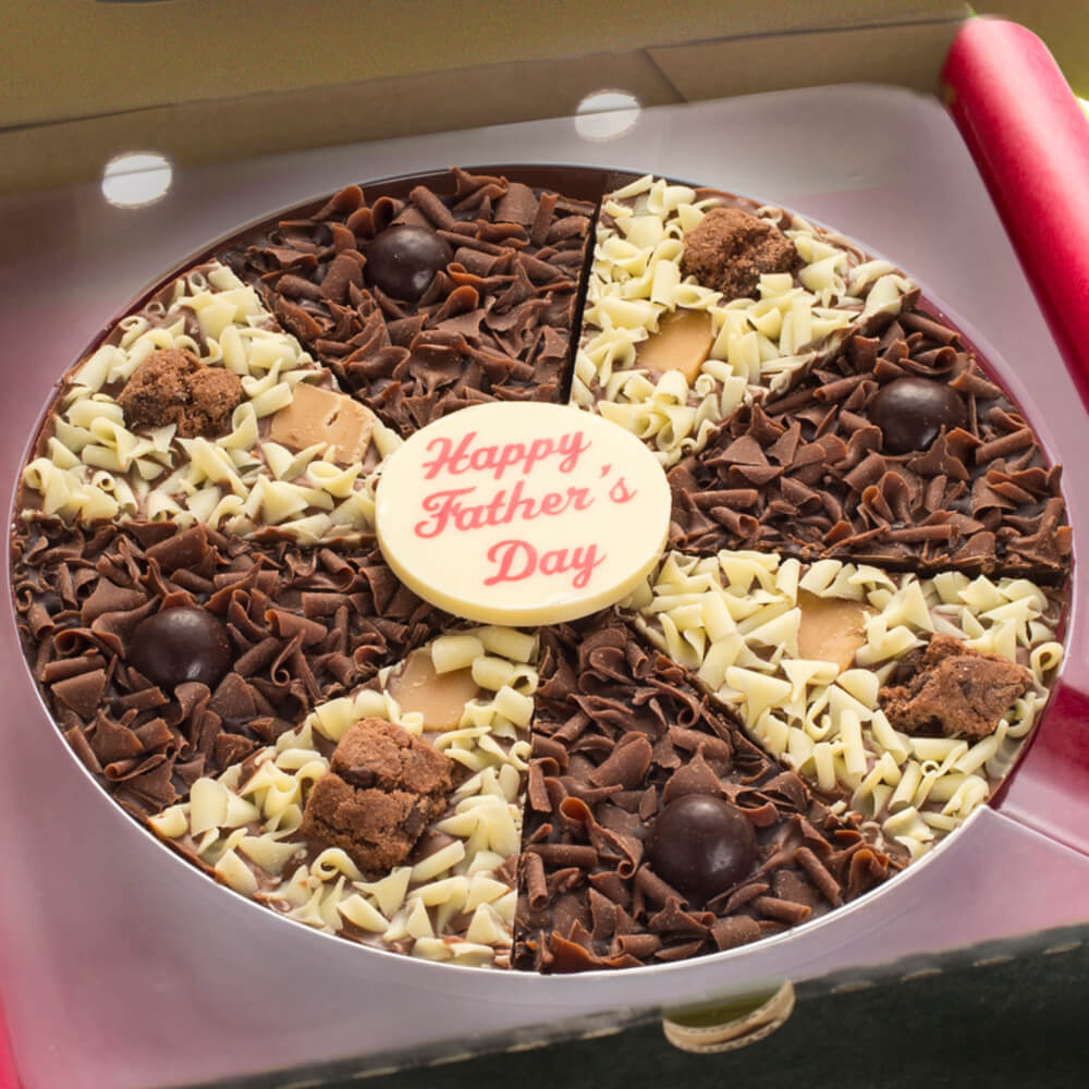 Our Father's Day Pizza offers both a milk and dark chocolate base and is topped with a mixture of milk and white curls, fudge and brownie pieces